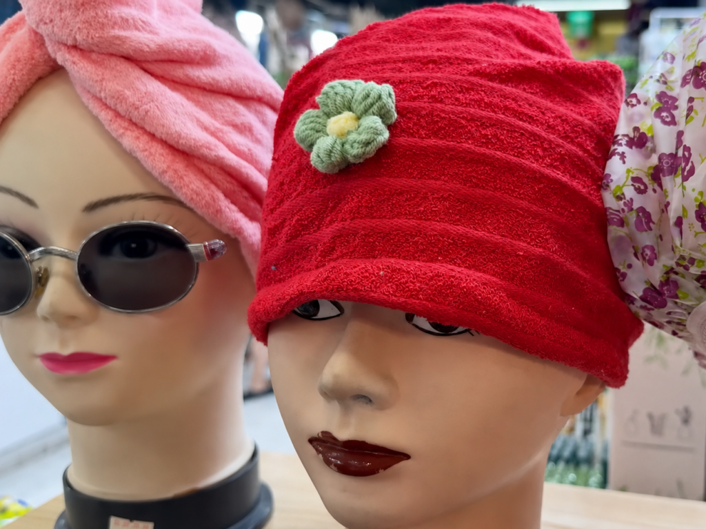 Colorful hat displays at Namdaemun Market in Seoul, a fun stop on a Seoul shopping route through Namdaemun